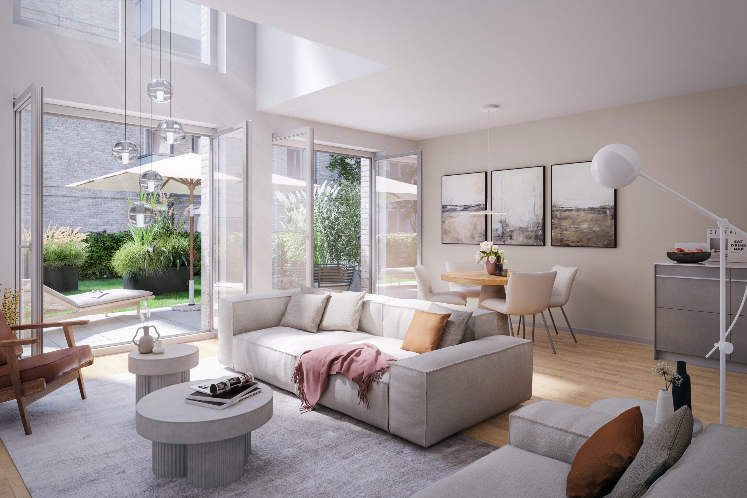 Helles Wohnzimmer mit Sofas, Esstisch, offenem Garten und moderner Deko.